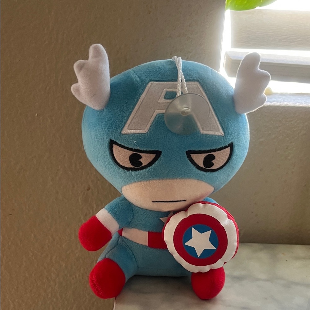 Blue and Red Plush Toy with Shield